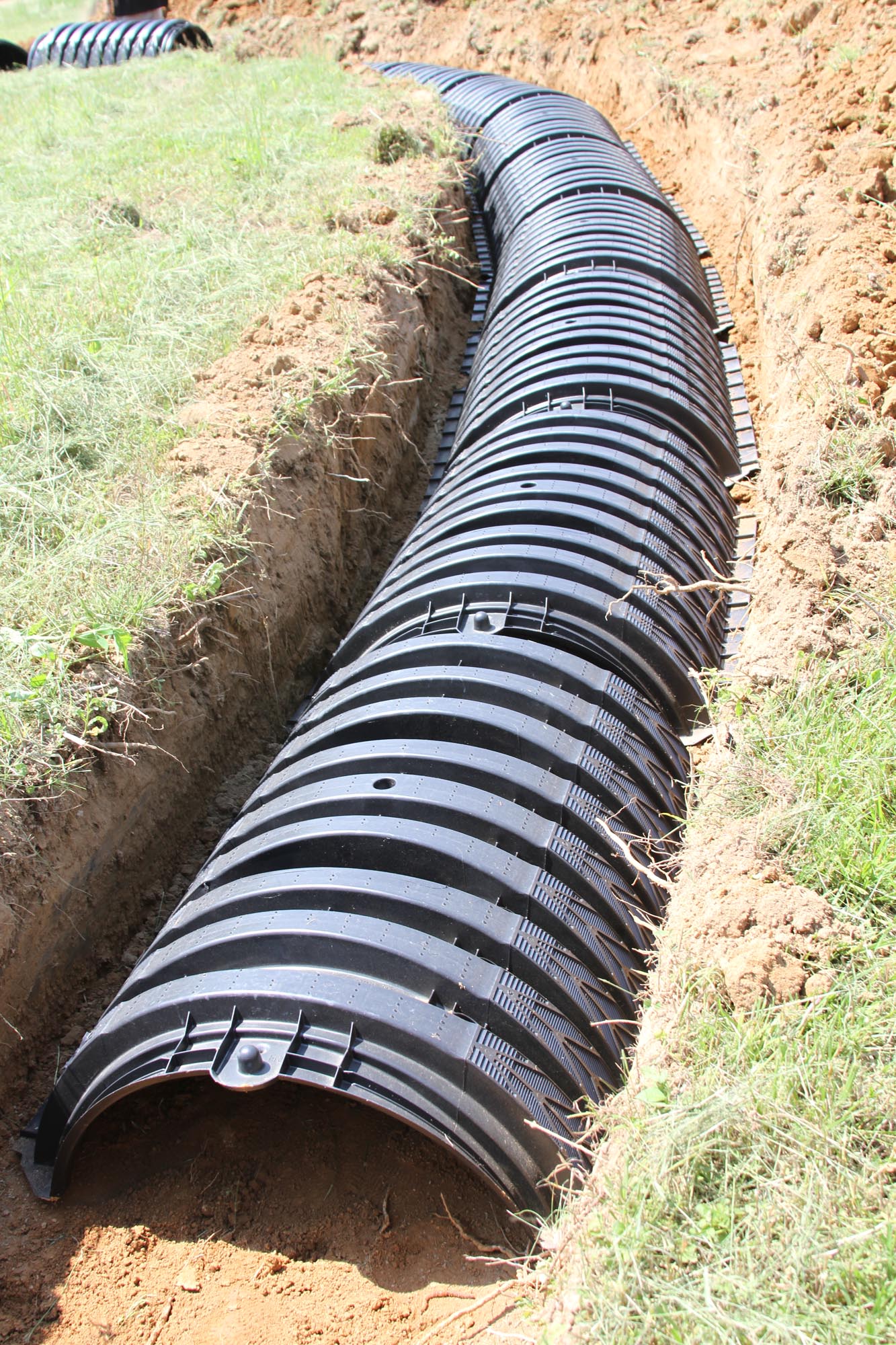 laying infiltrators into the lateral field of a new septic system installation