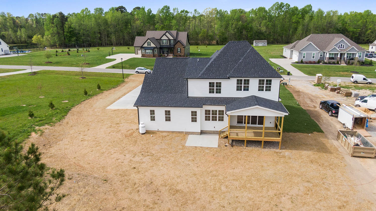 New home with septic system installation complete