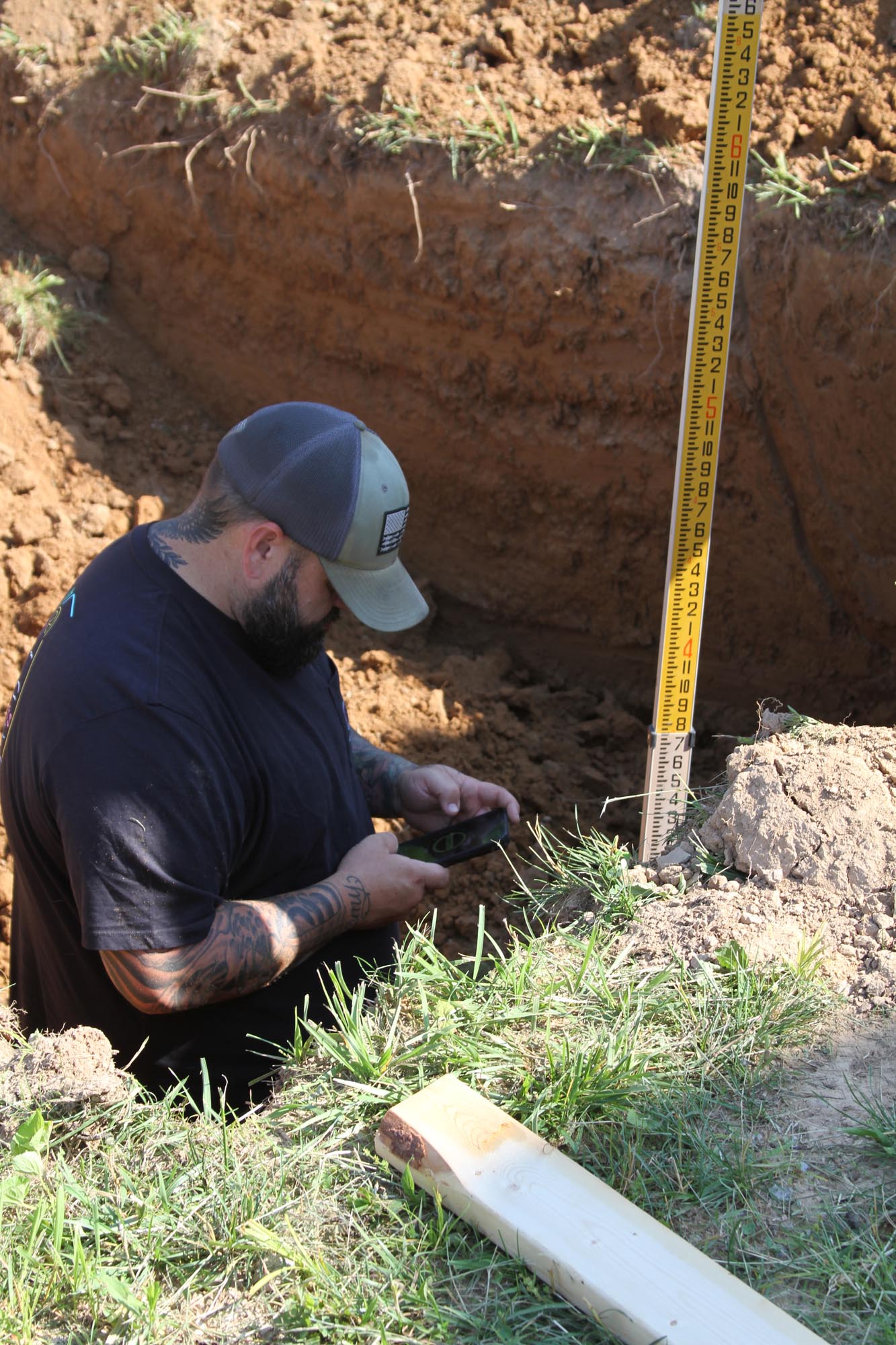 checking for proper depth of a septic tank